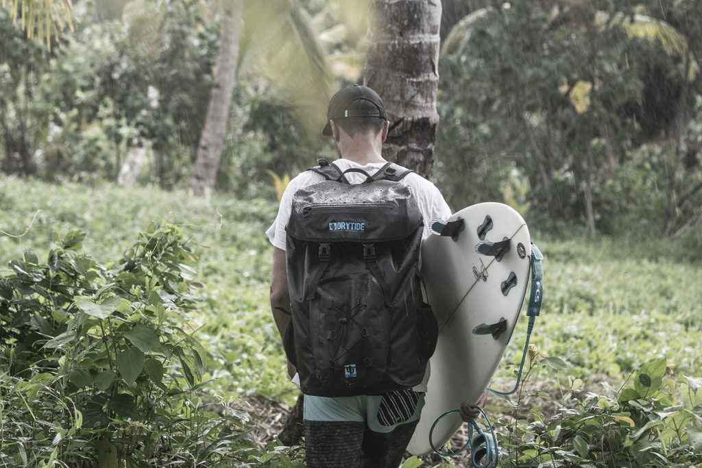 travel-backpack-in-jungle-rain